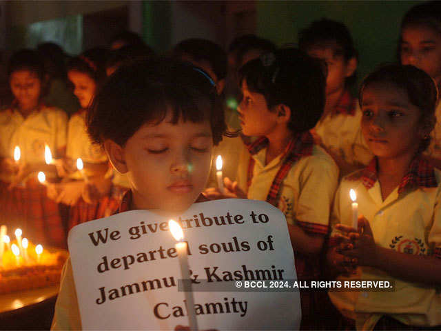 Offering prayer for departed soul of people died in J&K floods