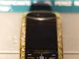 Mobile with diamond, gold incrustation