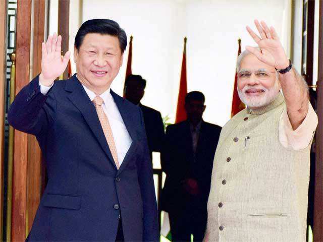 Modi waves along with Xi Jinping