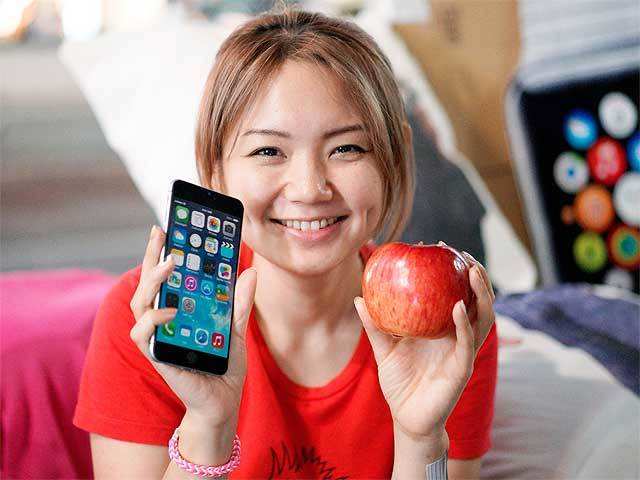 Apple enthusiast with iPhone 6 mock phone