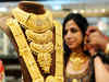 Gold drops to 9-month low; outlook by experts