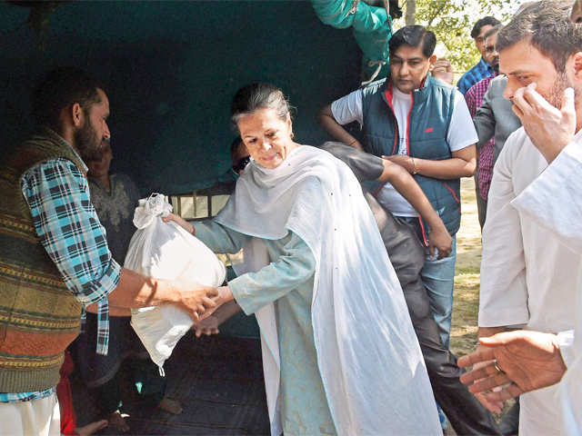 Sonia Gandhi distributes relief packges to flood victims