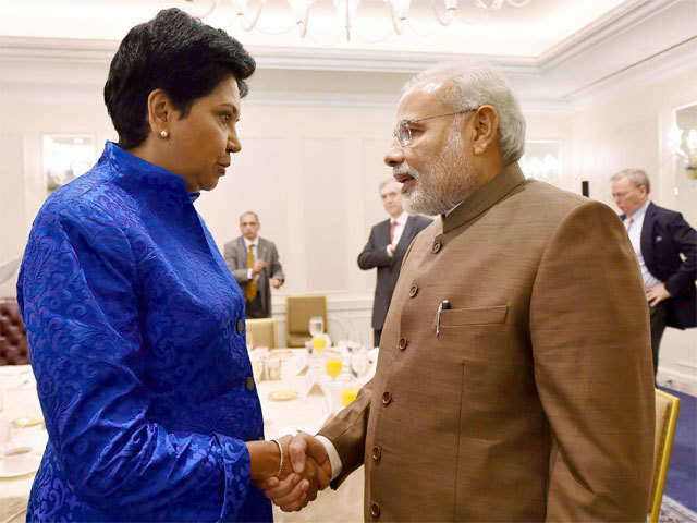 Modi shakes hands with Indra Nooyi