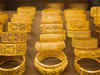 Hot commodities: Gold trades flat, crude prices slip