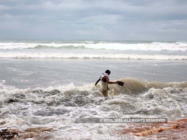 Rough waves lash against coastline