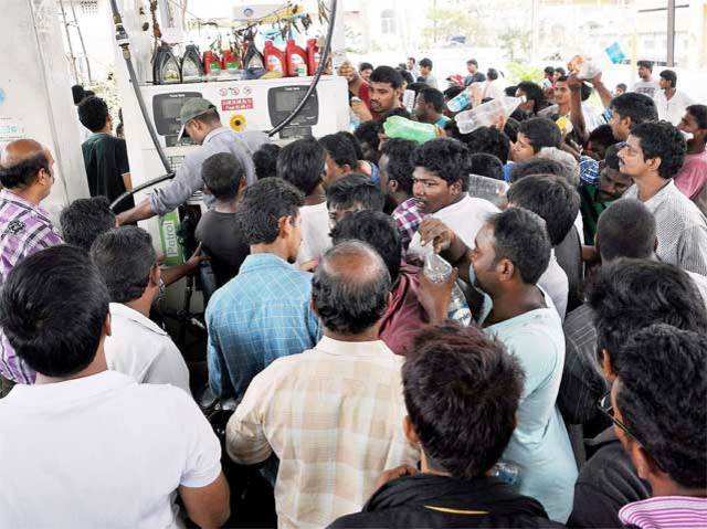 People crowd  petrol pump