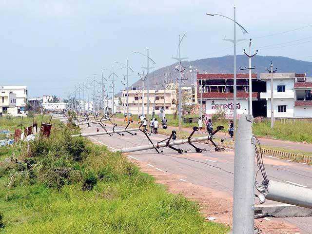 Broken electric poles after cyclone hit Vizag