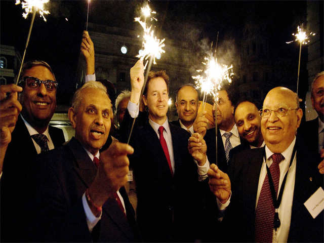 Britain's Deputy PM Nick Clegg celebrates Diwali