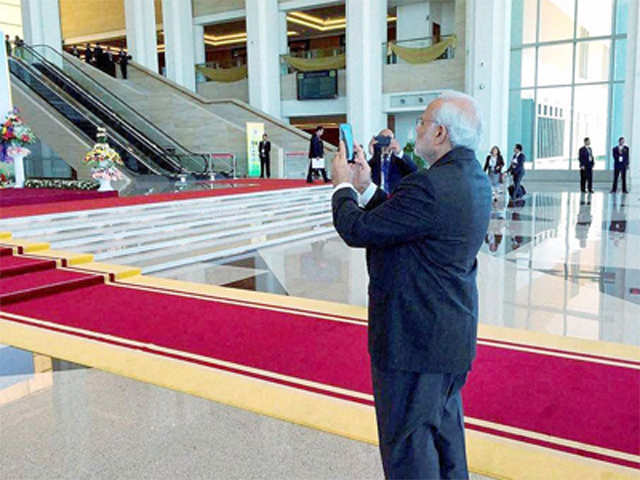 PM Narendra Modi takes picture at 25th ASEAN Summit