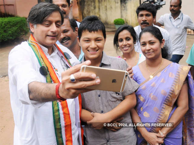 Shashi Tharoor takes a selfie with Rojan