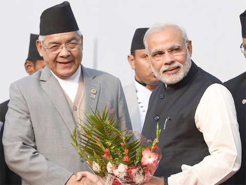 PM Modi being welcomed by Bamdev Gautamon