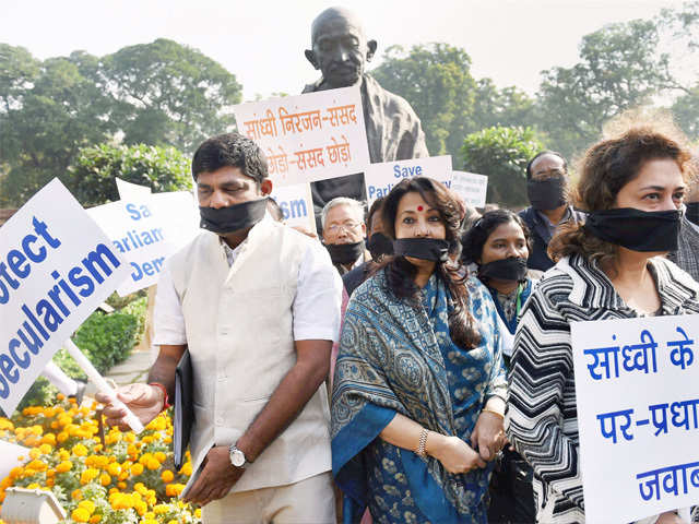 Opposition leaders holding at a protest at Parliament