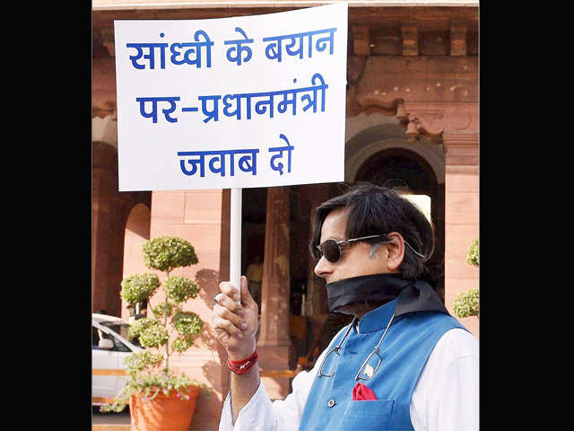 Congress MP Shashi Tharoor protesting at Parliament