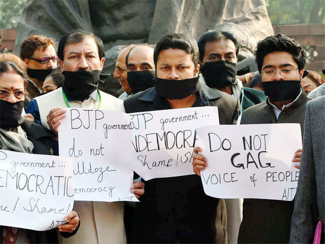 TMC members protest outside parliament