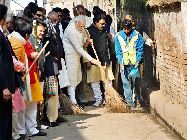 PM Modi cleans Assi Ghat in Varanasi