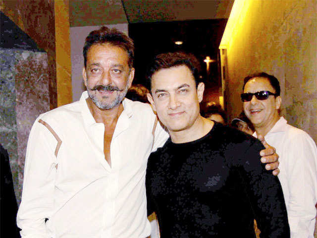 Bollywood actor Aamir Khan and Sanjay Dutt at the special screening of PK