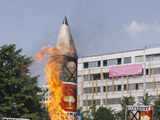 Anti-North Korea protesters burn a mock North Korean missile