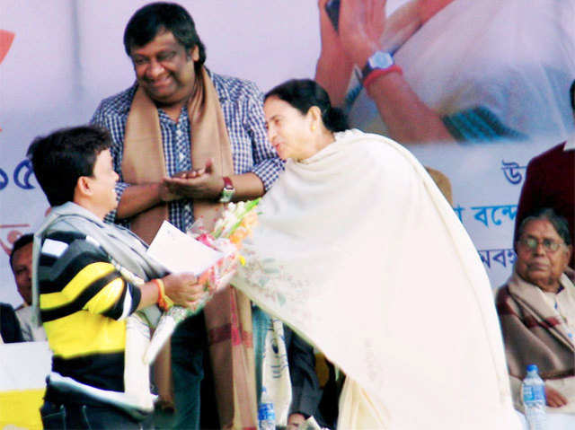 Mamata Banerjee presenting Bongo Ratna Award