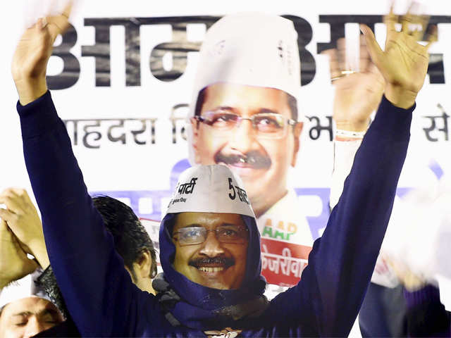 Arvind Kejriwal waves to his supporters