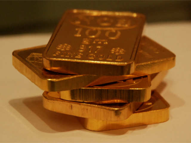 Gold futures decline 0.20 per cent on global cues