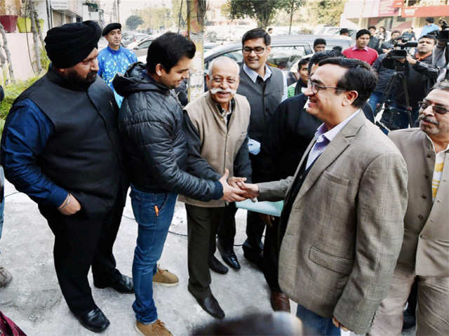 Ajay Maken arrives to cast his vote