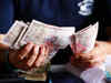 Rupee ends near 1-month low against dollar