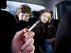 Britain bans drivers from smoking in cars