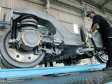 Technician works on carriage assembly