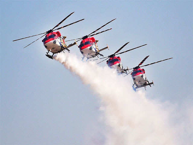 IAF helicopter display team ‘Sarang’ performs at Aero India 2015