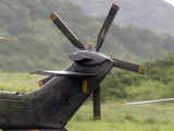 Brazilian Air Force carry the body of a victim