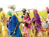 Mock battles of wrestling and sword fighting at Punjab's Warrior Holi festival
