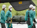 Brazilian Air Force unload corpse from chopper