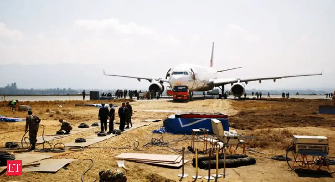 Nepal's Tribhuvan International Airport reopens after runway cleared ...