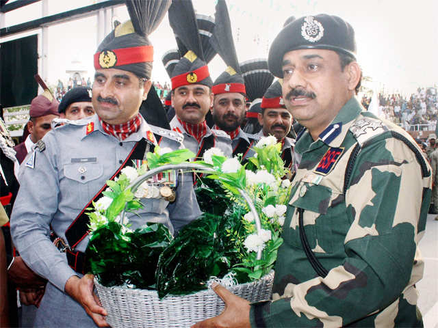 Pak Rangers officials giving sweets to BSF officials