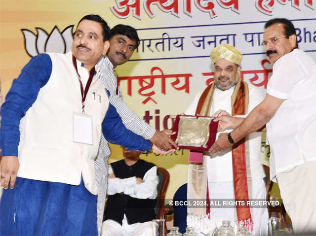 Amit Shah being presented a memento