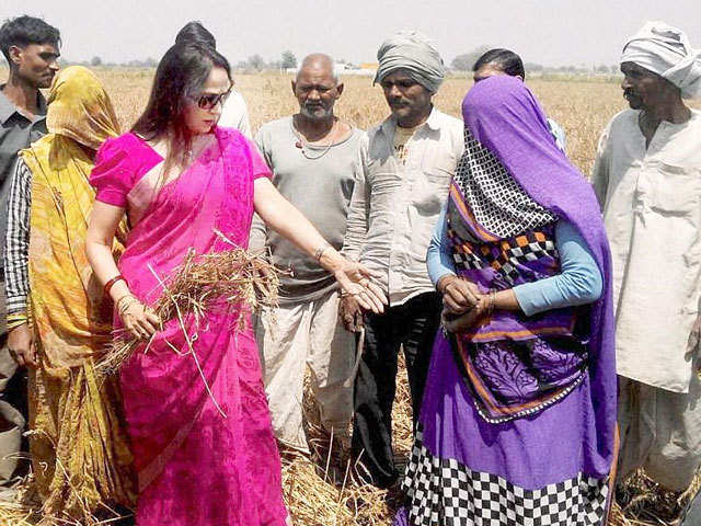 BJP MP Hema Malini talks to villagers