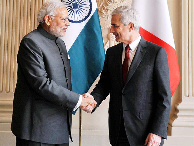 PM Modi shakes hands with Claude Bartolone