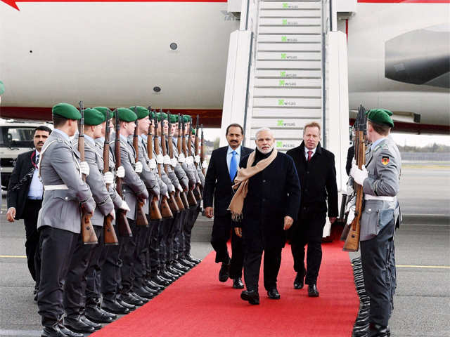 PM Modi being received by the Chief of Department of Visits