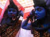 People dress as mythological characters for Thakurani Yatra