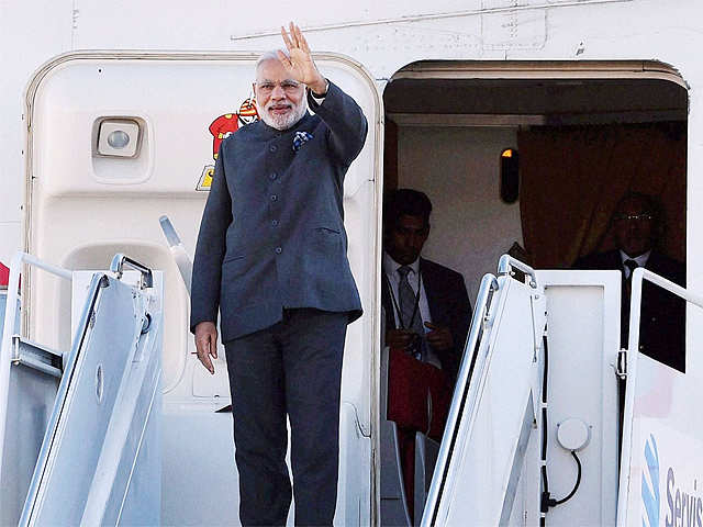 PM Modi waves on his arrival in Canada