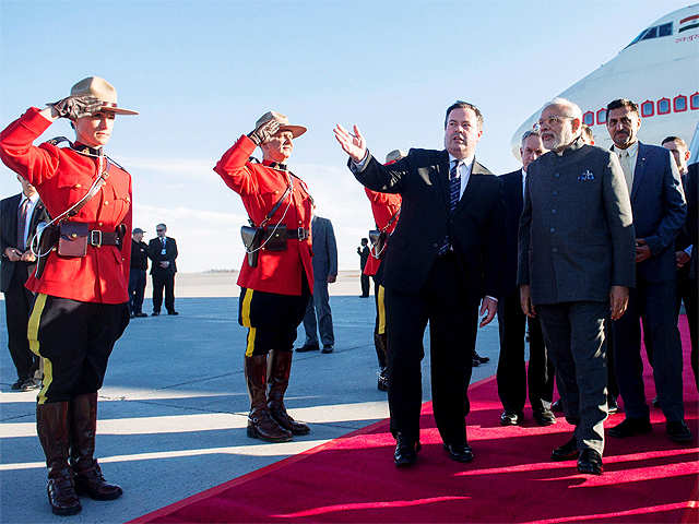 PM Modi walks with Jason Kenney