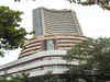 Sensex remains volatile, ends slightly lower