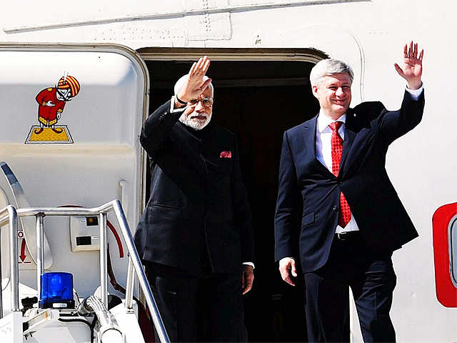 PM Modi with Stephen Harper wave on their arrival