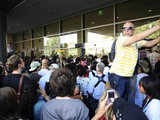 Fans and media gather outside UCLA hospital