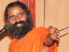 Reporter held for carrying live cartridges to Ramdev interview