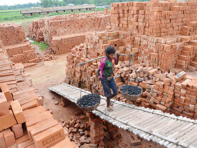 A man at a brick field on the eve of Labour Day