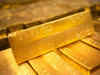 Gold edges off three-month high as dollar firms