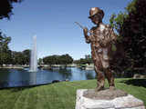 Bronze statue overlooks the road