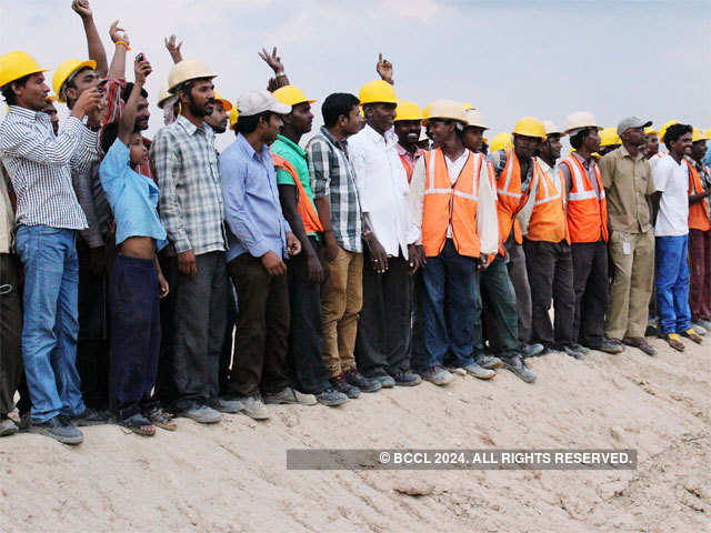 Workers cheer for CM Siddaramaiah in Karnataka