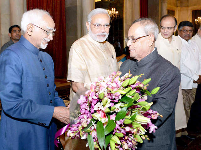 President recieves bouquet from Vice President